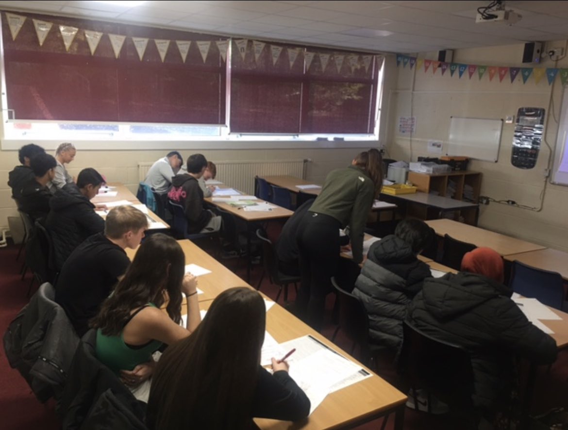 Year 11 students working hard in their <a href="/RBHSEnglish/">RBHS English</a> session while @EducateDearden checks their progress and offers expert help.