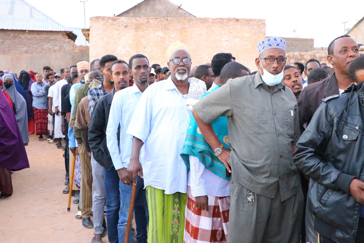 PECPuntland's tweet photo. #OnThisDay in 2021: Thousands of people in the districts of #Qardho, #Eyl and #Ufeyn were queued in long lines to exercise their constitutional rights and vote🗳️for their local councils, the first ever #1P1V election in #Puntland. https://t.co/PiFpdAVY5r