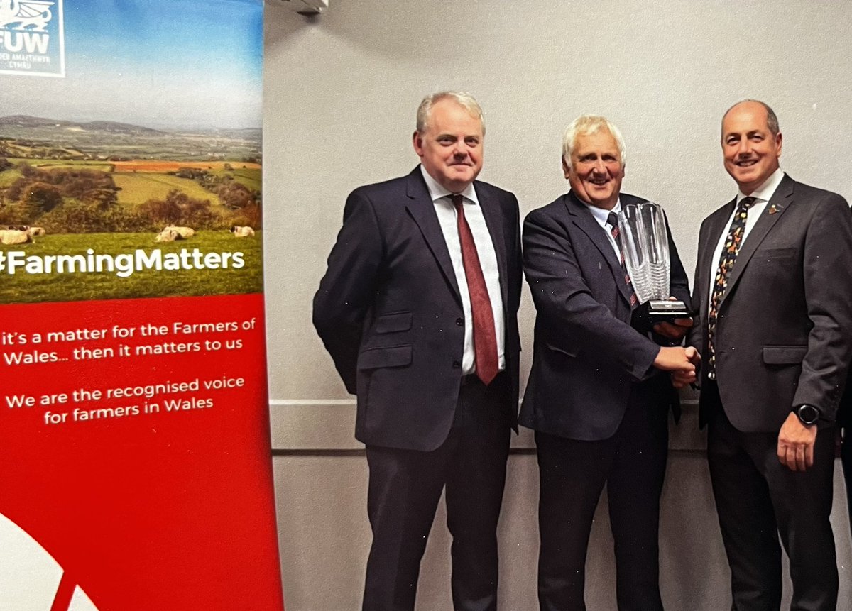 Honoured to have been presented with the @FUW_UAC award for ‘Outstanding service to Welsh Agriculture’. Falch iawn. Very proud. Diolch o’r galon.
