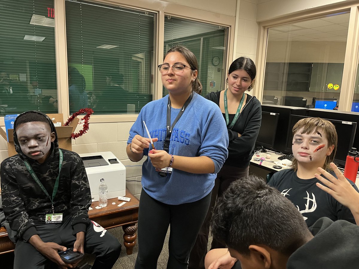 PRHS_Tech's tweet image. TV production students putting on makeup to record a scene for their commercial for a product for a monster project. They will be filming monsters.