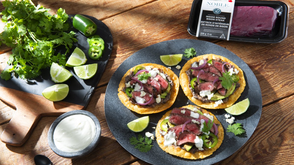 We never get tired of tacos, carnitas or tostados! Find bison recipes for these &amp; much more on our website. So get 'Cooking' and make it nutritious &amp; sustainable bison meat! Available in the fresh meat counter at retail locations right across Canada! Visit our Where-to-Buy online