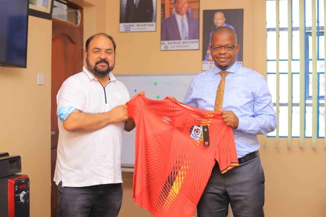 BidcoUganda's tweet photo. Our Deputy General Manager Mr. Sankha Chatterjee made a courtesy visit at FUFA House today. Where he was presented an Original Customized jersey of @UgandaCranes by @OfficialFUFA  President @MosesMagogo https://t.co/vp1CmthACL