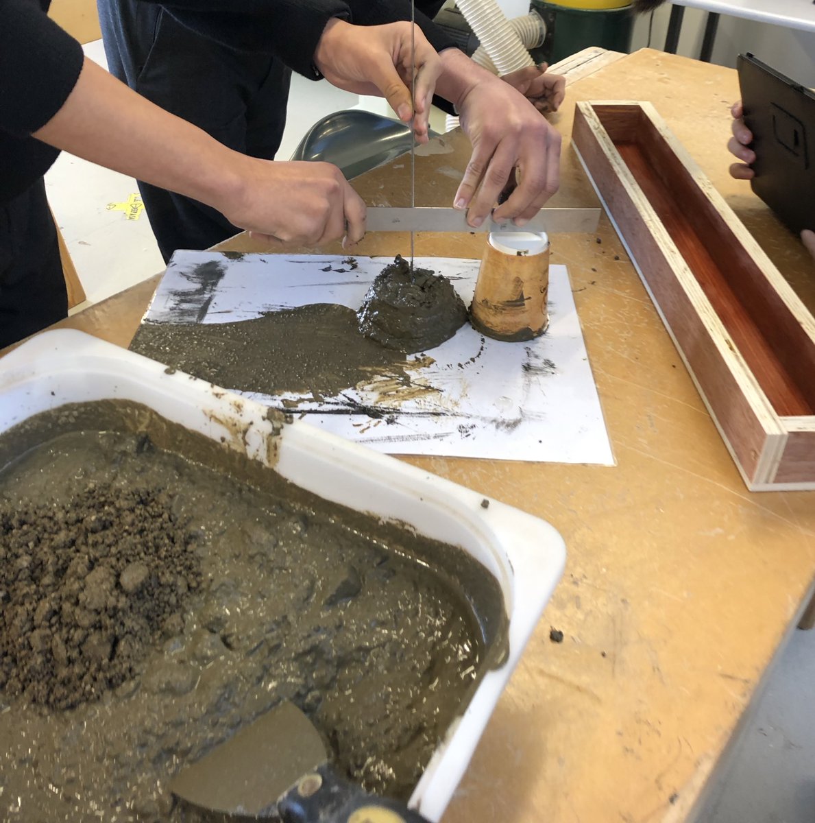 JamesORiordan2's tweet photo. Busy couple of lessons with 5th year @lecheiless construction students where they learned to mix, compact and place concrete while completing slump and strength tests. Bit of a mess to clean up but well worth it! #constructionstudies #concrete https://t.co/ivx6wk3Hi0