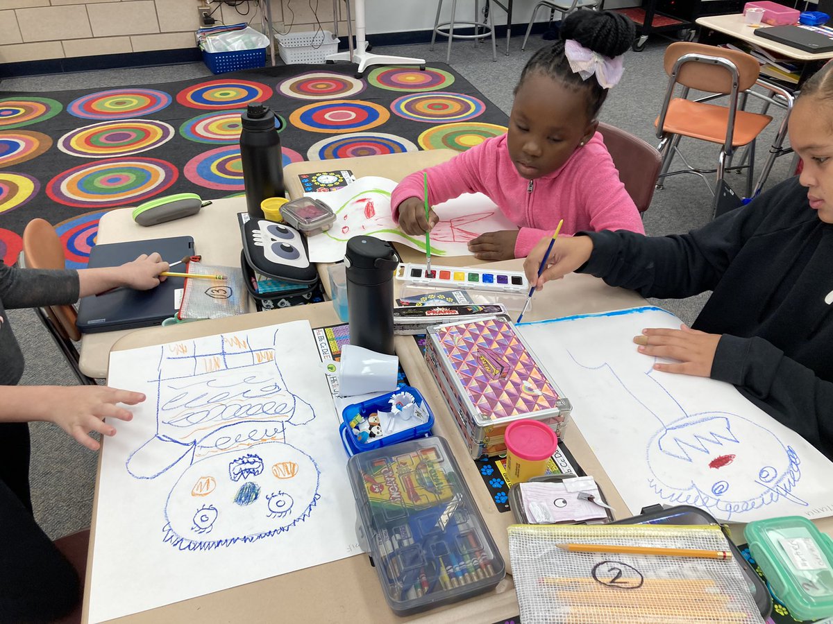 Some third graders using art to make connections to what they are reading. #GCpride