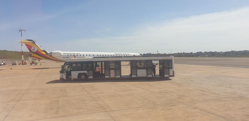 Power at Entebbe airport goes off like 4 times in a space of two hours. When a generator is switched on, some parts of the duty-free shops remain dark. No AC leaving the poorly aerated waiting lounges hot. Then while departing, passengers enter scorching buses which have no AC