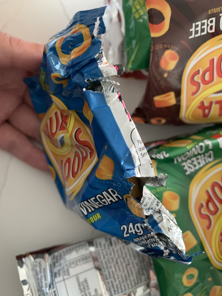 twoconejaz's tweet photo. @HulaHoopsUK bought a multipack from @sainsburys and one of the packets looks like it’s been ripped open by a rat????? https://t.co/TX0MBc3Lll