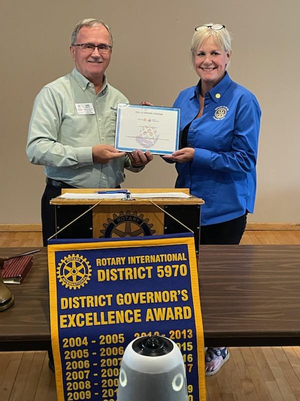 5970Rotary's tweet image. On Monday, October 24, District Governor Don Meyer visited the Charles City Rotary Club.  He presented Club President Kay Winkelman with the Rotary Citation for 2021-2022.