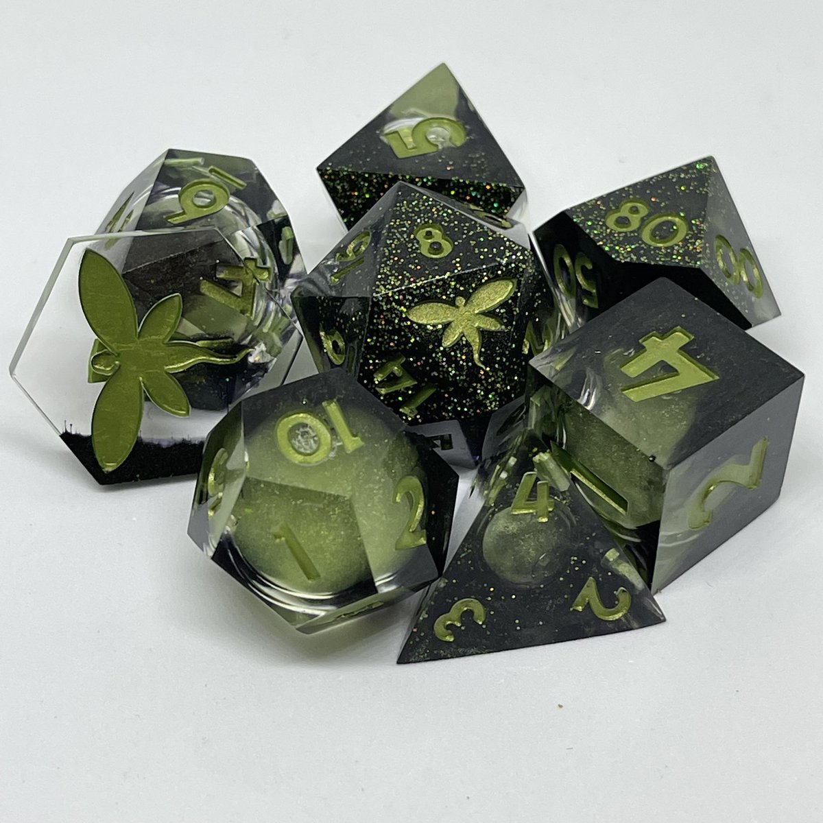 ArcaneFey's tweet photo. If you’re looking for some spooky dice, these are and more are available in the shop right now! #dice #dnd #dnddice #ttrpg #handmadedice https://t.co/q3AxzV9CUH