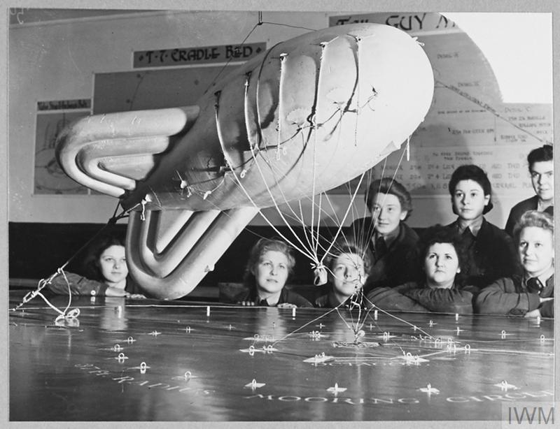 WW2Airfields's tweet photo. I love that barrage balloon operators were trained on mini / model barrage balloons. 

I wonder if any of these barrage balloon models still exist today... I want one. 🎈

Here are some photos I believe taken at Cardington showing WAAFs in balloon training. 

All images © IWM. https://t.co/Ujb6Iw4MCx