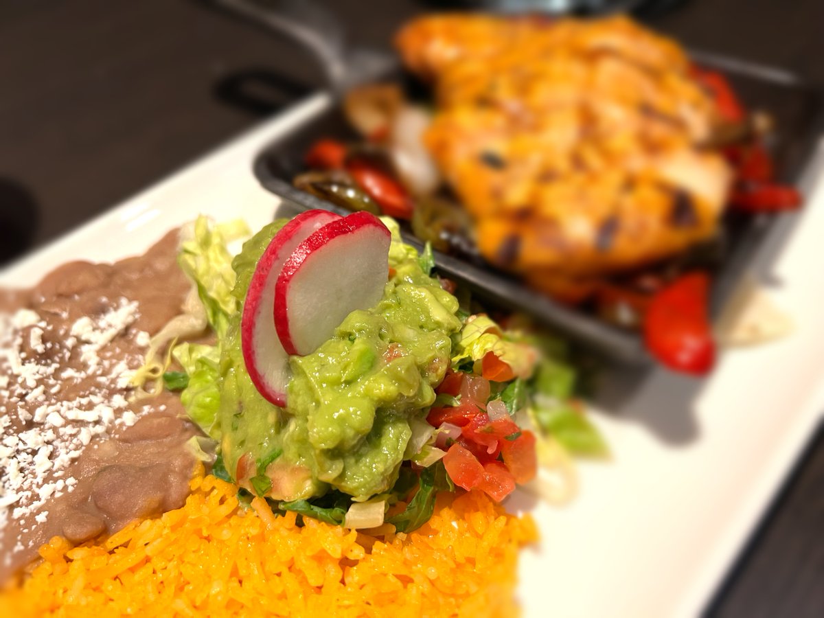 Have you joined us for lunch yet? Stop by today to try our mouthwatering chicken fajitas! That guacamole will disappear before you know it. 👀