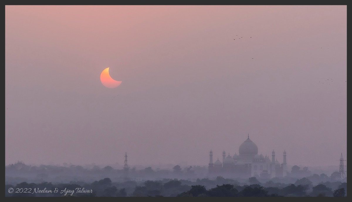 *The Taj Solar Eclipse*

The Partial Solar Eclipse of 22nd October 2022. The moment of maximum obscuration as seen from The City of The Taj Mahal.

Looks like the celestial conjunction is trying to imitate the shape of the edifice, the dome of the Taj Mahal, Agra.
