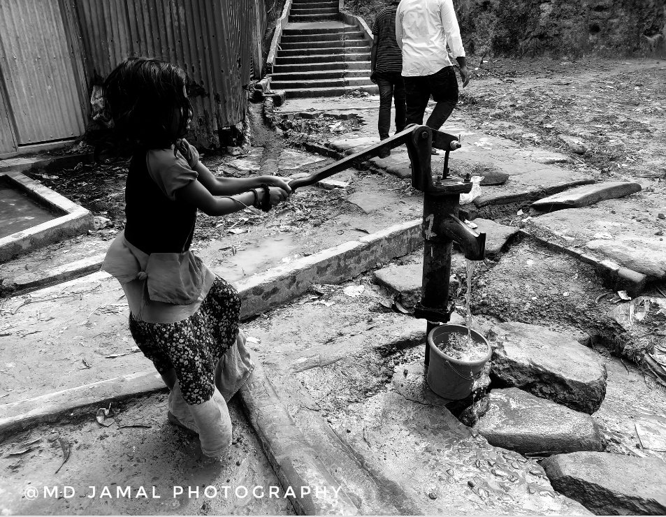 A Rohingya  girl collecting drinking water from a tube well #Rohingya #Refugee Camp Cox's Bazar in Bangladesh #MdJamalPhotography #rohingyaphotography #photographylovers #Rohingyalife #whitephotography #documentaryphotography #rohingyacrisis #saverohingya