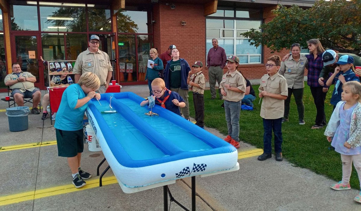 What fun activities do you do at your pack meetings? Polson #CubScouts held a Raingutter Regatta at Cherry Valley Elem. School during their first meeting of the year. #Scouts raced against each other by blowing through a straw to make their boat move. #MontanaCouncil #BSA