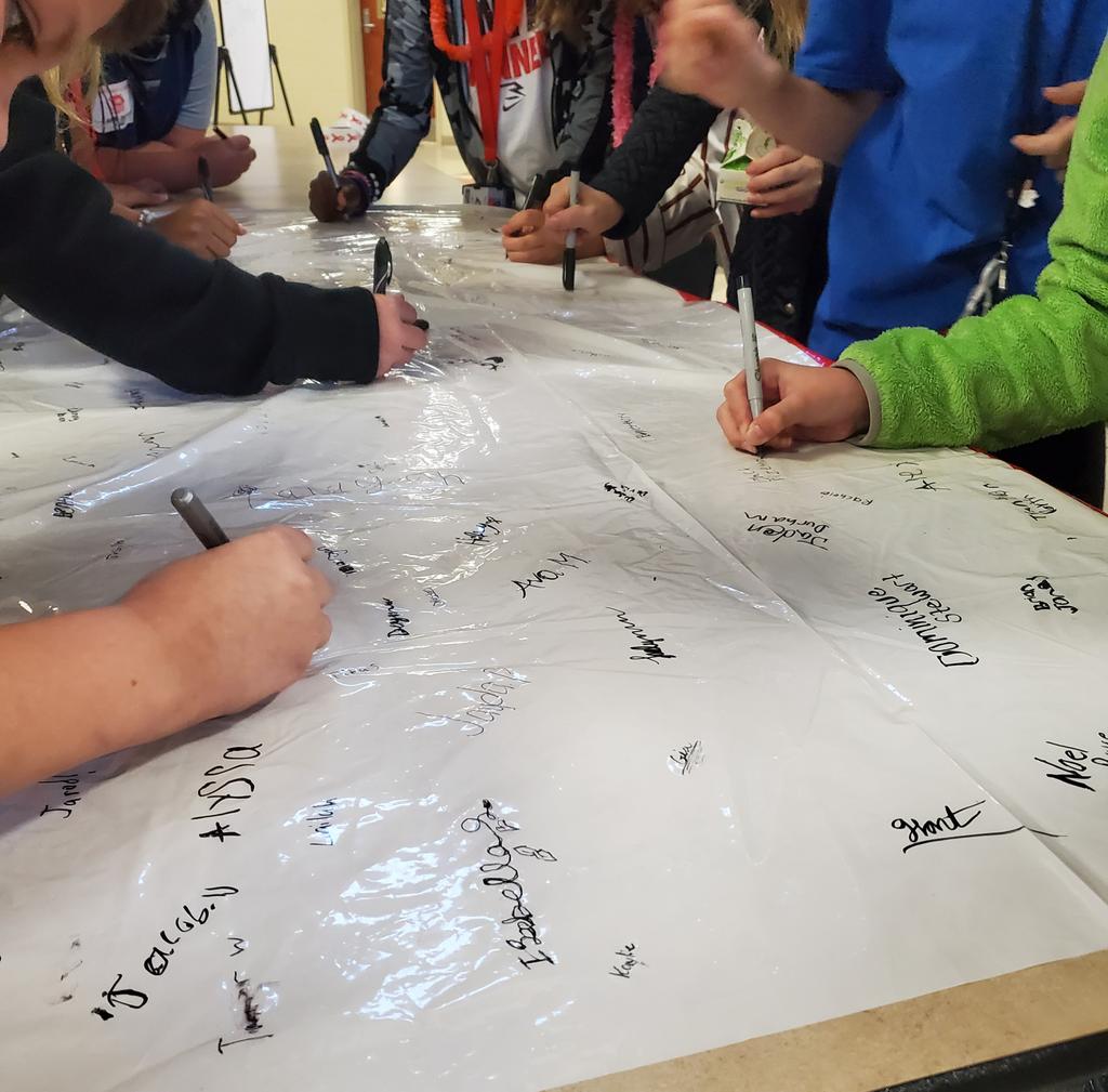 whit_farrell's tweet photo. Day 2 of #CSMSRRW students signed the pledge banner at lunch and received a red ribbon for their ID badges as a daily reminder β€οΈ @CSMS_Huskies #RedRibbonWeek https://t.co/qz1gAsmZoC