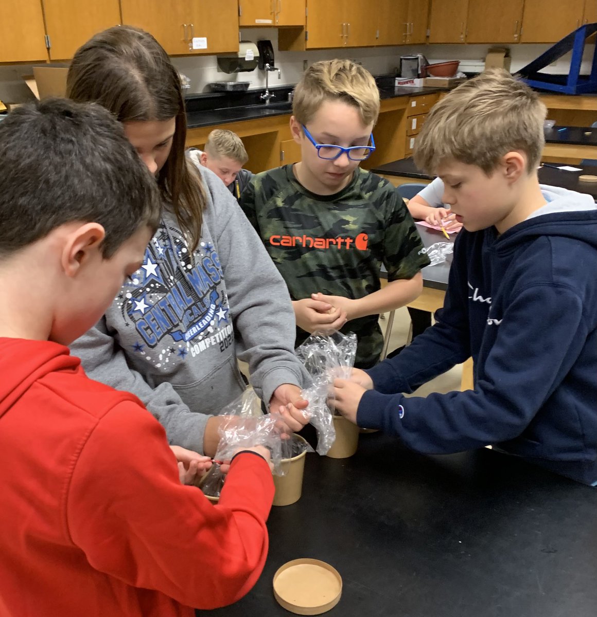 MrsAndersoncms's tweet photo. What will happen to 10 different items if we bury them in soil for 6 months? We made our predictions, closed our pots and put them away! Will they decompose? Time will tell! #sciencerocks #handsonlearning #handsonscience @cms_grizzlies https://t.co/g0hnx0uu95