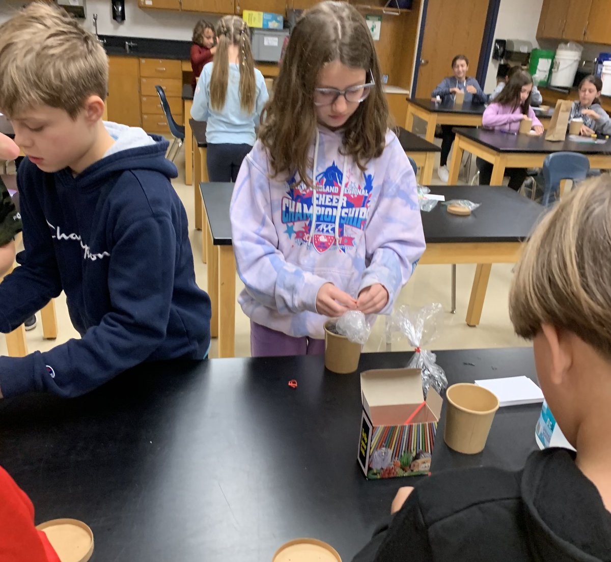 MrsAndersoncms's tweet photo. What will happen to 10 different items if we bury them in soil for 6 months? We made our predictions, closed our pots and put them away! Will they decompose? Time will tell! #sciencerocks #handsonlearning #handsonscience @cms_grizzlies https://t.co/g0hnx0uu95
