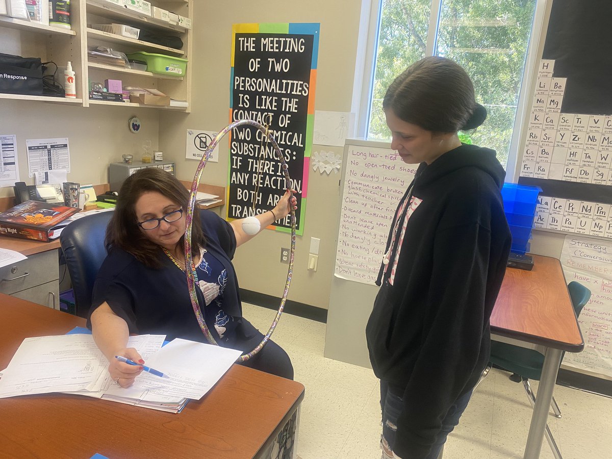 Mrs. Gilke is simulating the Rutherford Gold Foil Experiment.