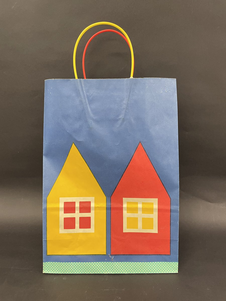 298/365: This Bloomingdale's bag features a beautifully simplistic Scandinavian design of two houses in bright colors against a blue background.