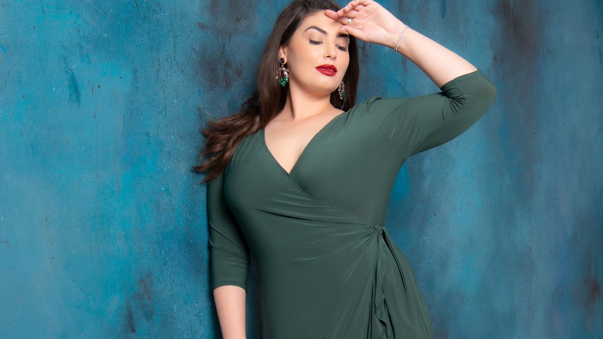 Looking for a fun dress for the holiday season? Our Whimsy Wrap Dress in Hunter Green features beautiful cascading flounces along the skirt and its wrap functionality makes it the perfect silhouette for all curvy body types. Save 20% with code FLASH20 at kiyonna.com/plus-size-clot…