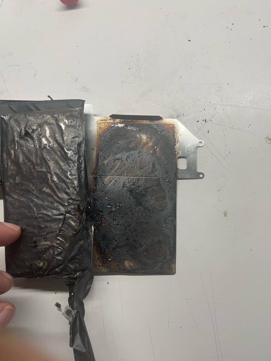 SpencerFire1's tweet photo. And this folks is why you NEVER charge a device with a lithium ion battery on anything soft and not in you presence. Never plug it in and leave. This person was very lucky. The device wouldn’t charge and the person took it in for service and they found this. https://t.co/lJvlb8ziAY