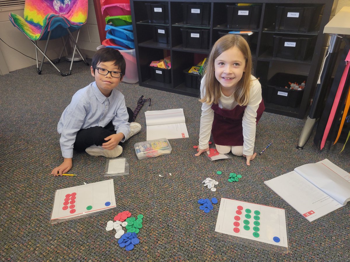 We have examined place value through popsicle stick bundles, then dollar bills, &amp; now place value discs. This progression from concrete to abstract concepts brings meaning to numbers. I wish I would have learned math this way!