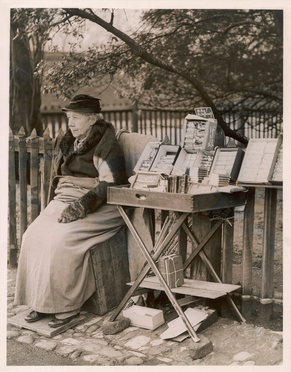 fakehistoryhunt's tweet photo. A woman sells chocolate on the street in Kensington, London, 1930s.
Image credit: Mary Evans Picture Library

Before basic state pensions looked properly after those who deserved to take it easy, many had to work as long as they could just to get by.
I wonder what her story was. https://t.co/x1i0r0BuHW