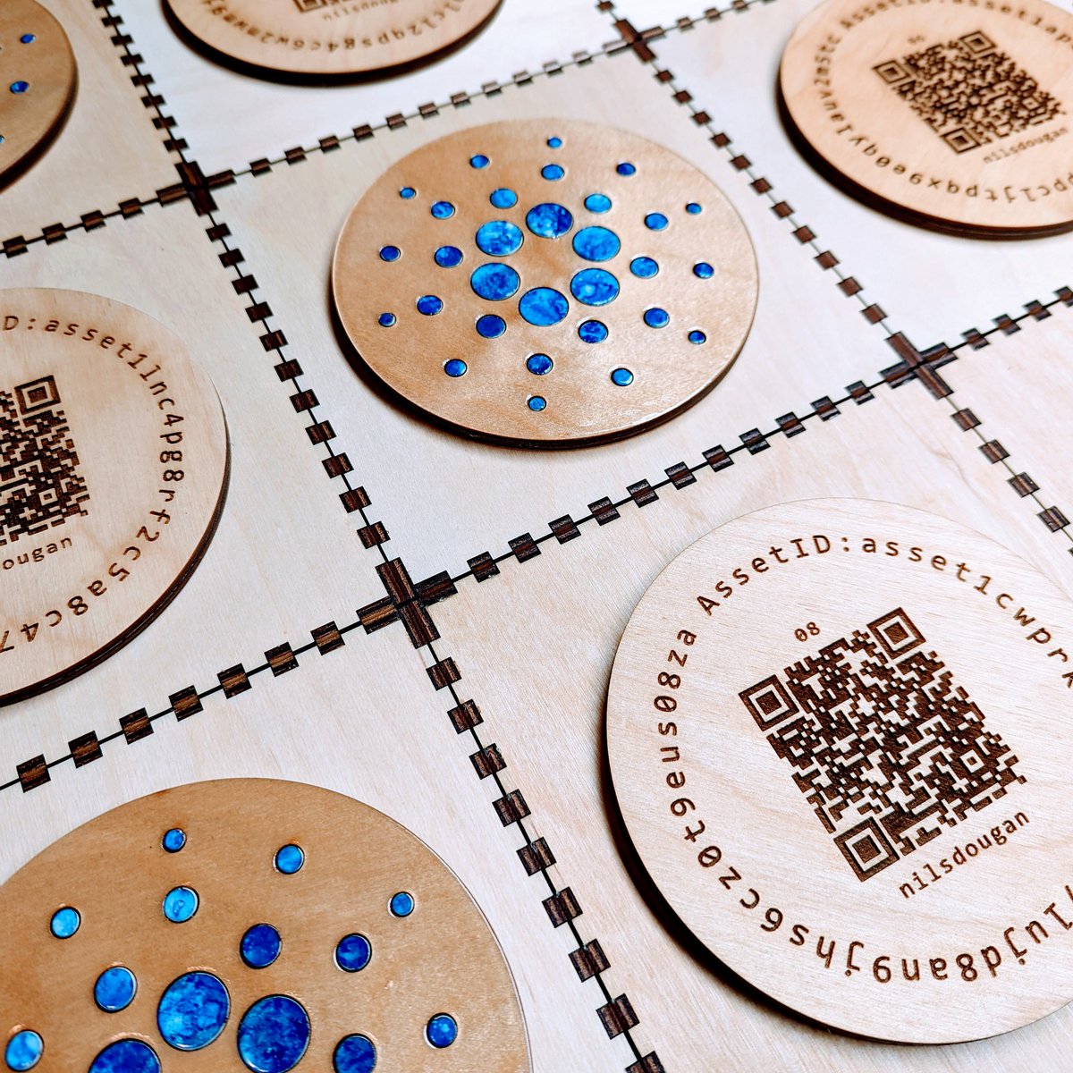 Who in the #CardanoCommunity is interested in physical-digital NFTs? I've created 10 watercolor and laser cut wood tokens that have AssetIDs permanently etched into them. QR codes scan to reveal metadata including ownership and legal rights. Launching soon <a href="/artano__io/">Artano.</a>  #CNFT
