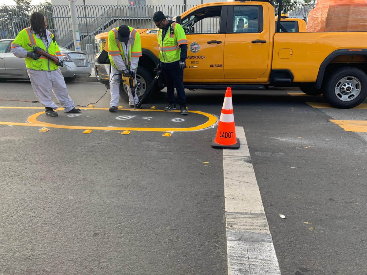 LADOTofficial's tweet photo. We're in progress of implementing the largest #SlowStreet installation yet in Jefferson Park w/ @UNNC! Improvements include five traffic circles, signage, and center line dividers to slow vehicles, prevent street takeovers, and encourage residents to enjoy being active outdoors. https://t.co/ZvliKHPDI5