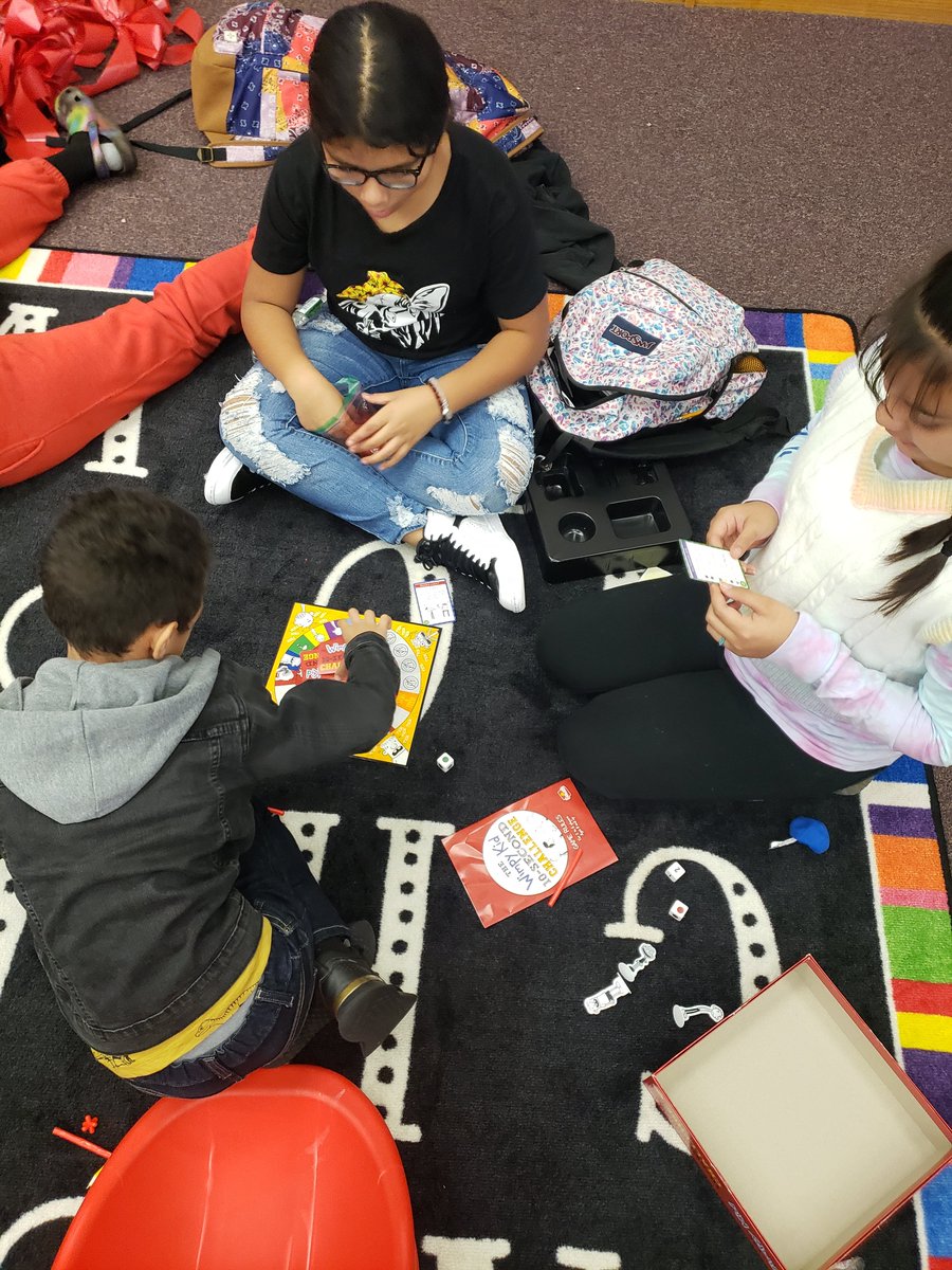 pcal1028's tweet photo. So @wimpykid new book came out today, naturally, we celebrated! #lifeinthelibrary #diperoverlode #10secondchallenge Thank you #donorschoose for helping me to get the game and book..the day it came out!! #teachertwitter https://t.co/unLBZEiZof