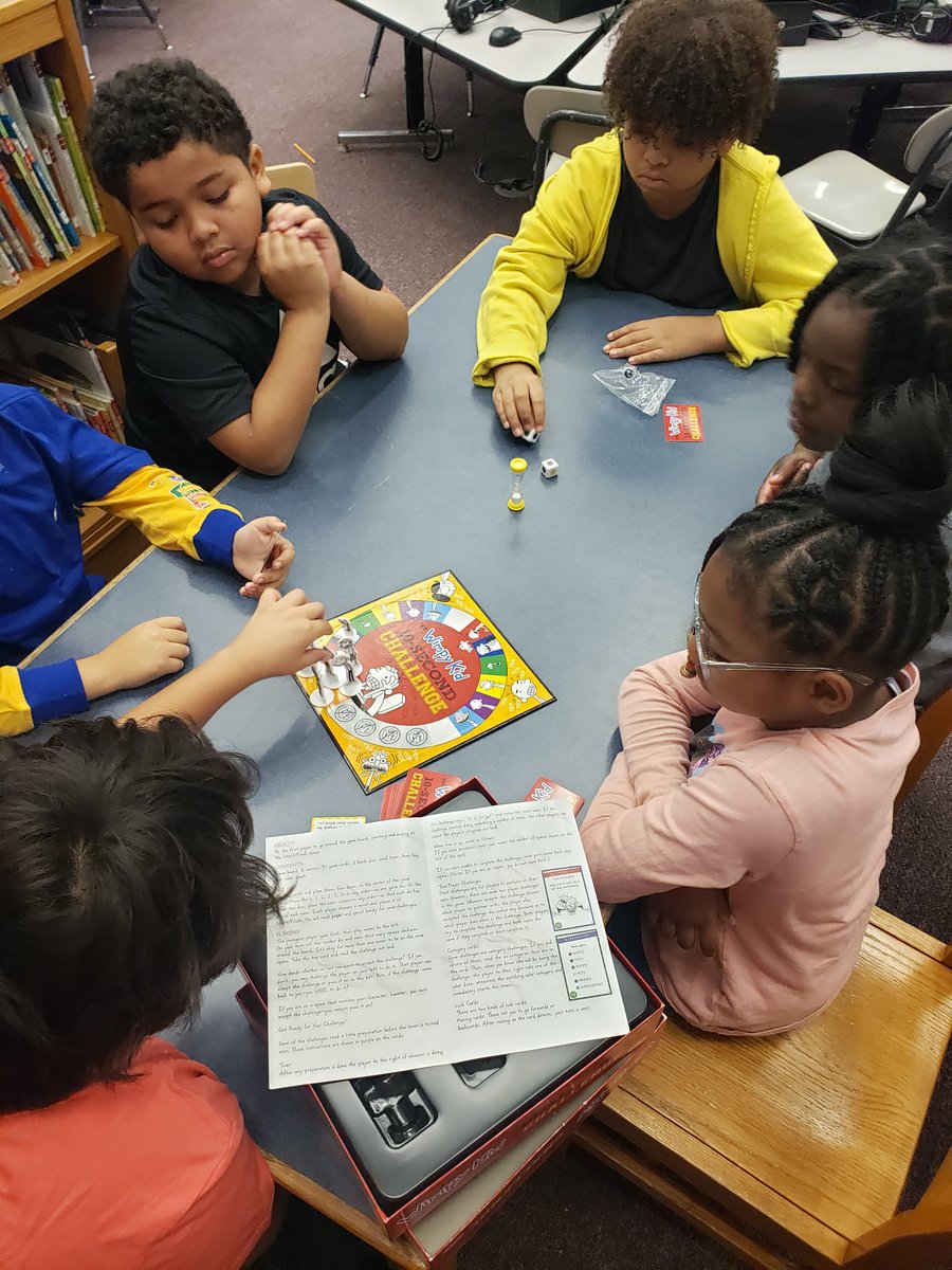 pcal1028's tweet photo. So @wimpykid new book came out today, naturally, we celebrated! #lifeinthelibrary #diperoverlode #10secondchallenge Thank you #donorschoose for helping me to get the game and book..the day it came out!! #teachertwitter https://t.co/unLBZEiZof