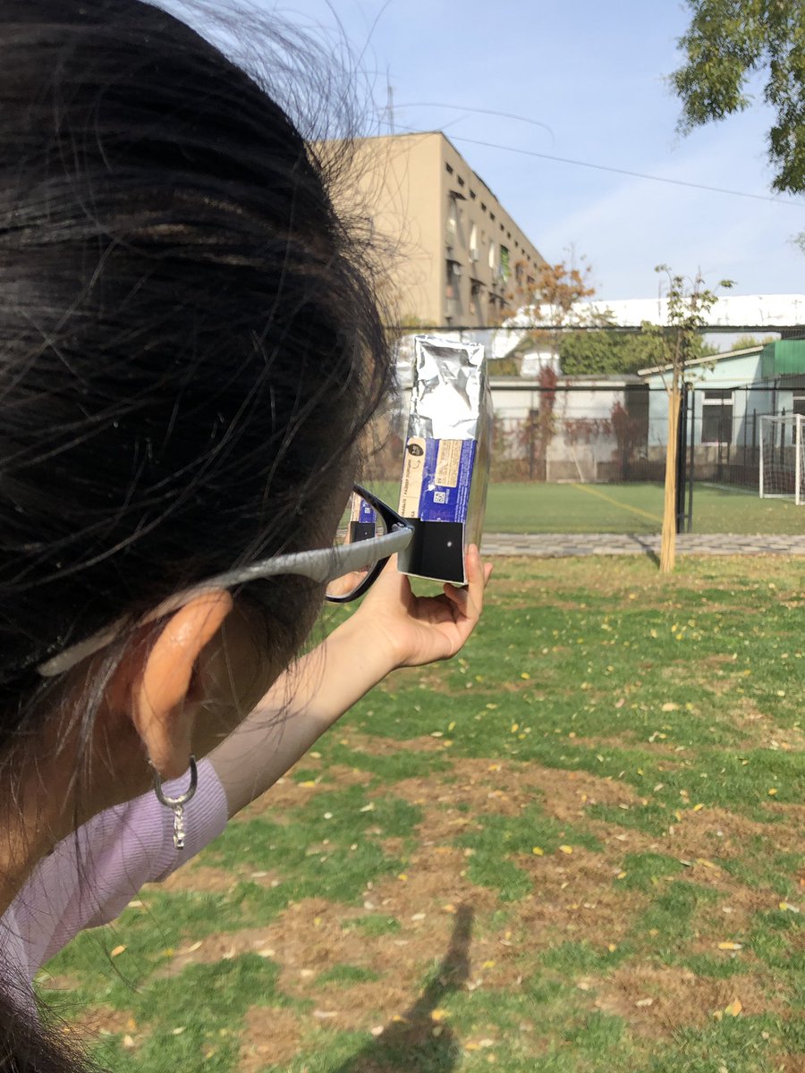 #Tashschool teachers and students viewing the partial #SolarEclipse. <a href="/DohaDerek/">Derek Nelson</a> <a href="/WaLead_B/">Walid B.</a> <a href="/billkralovec/">Bill Kralovec</a> #science #nature