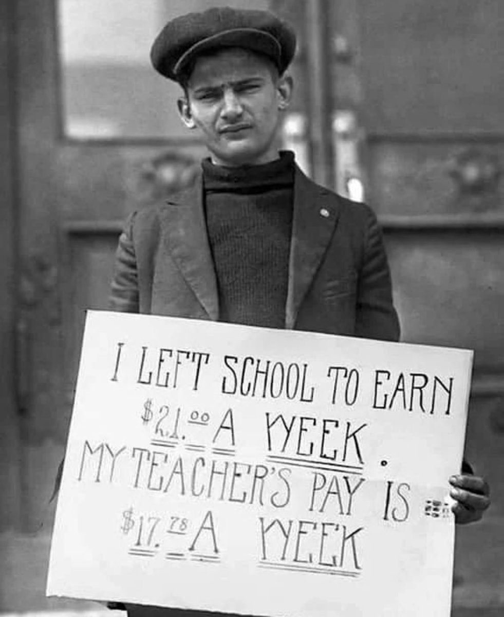 A young man demonstrating against low pay for teachers, 1930