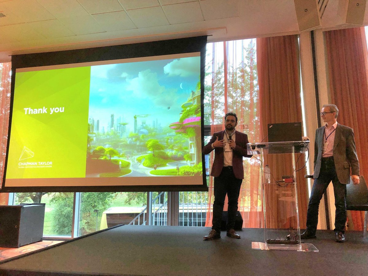 MichaelSwis's tweet photo. A pleasure to see my @Chapman_Taylor colleagues on stage presenting the closing #keynote at the Leading European Architecture Forum #LEAF2022. @EsfahaniAlex & @bimwood sharing their insights on how we can acheive a #zerocarbon future #architects #masterplanners #interiordesigners https://t.co/GYyQO8YcTR