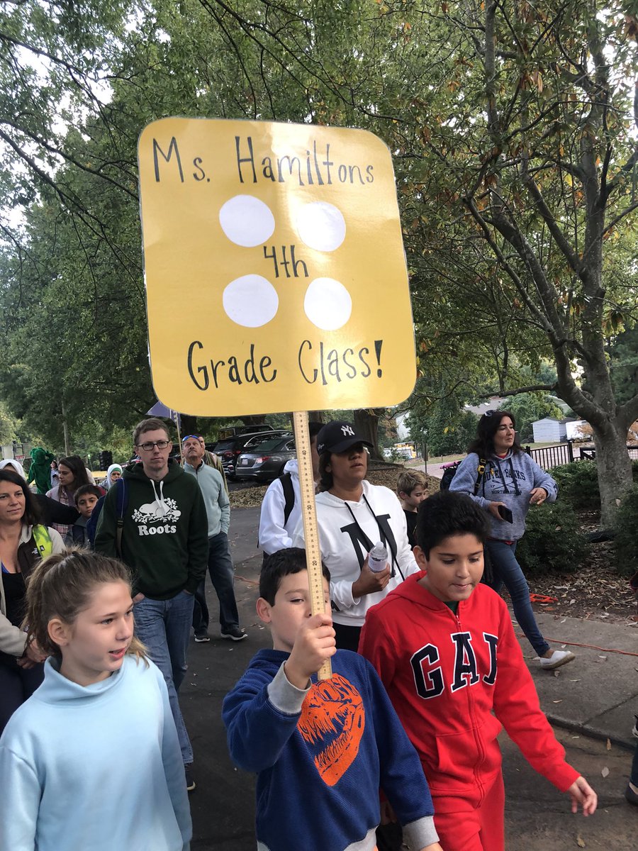 Combs4th's tweet photo. @CombsCatchUp @wcpssmagnets @CentralWCPSS @TheLeaderinMe Walk to school is BACK and STRONG! Love these young leaders! Go 4th grade! https://t.co/c6EnH5vauE