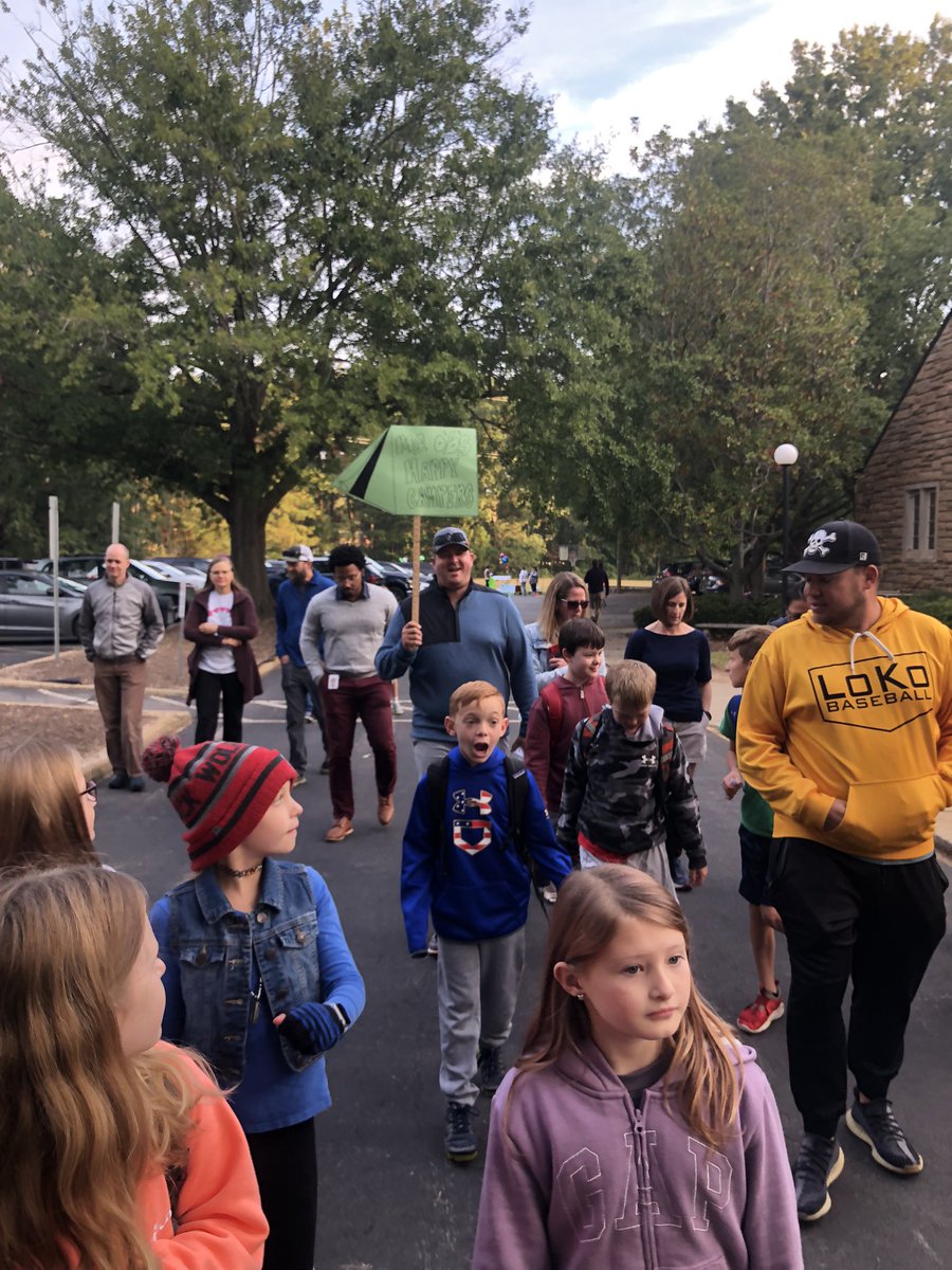 Combs4th's tweet photo. @CombsCatchUp @wcpssmagnets @CentralWCPSS @TheLeaderinMe Walk to school is BACK and STRONG! Love these young leaders! Go 4th grade! https://t.co/c6EnH5vauE