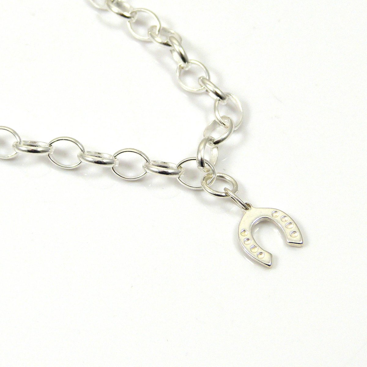 TheStrandline's tweet photo. Sterling Silver Horseshoe Bracelet. 4mm links, Charm Bracelet, Silver Bracelet, Horseshoe Bracelet, 925 Bracelet, Silver Jewellery https://t.co/SV65BPcYP5 #shopindie #thestrandline #HandmadeHour #UKGiftHour #supportsmallbusiness #DelicateBracelet https://t.co/dApqLS3IYN