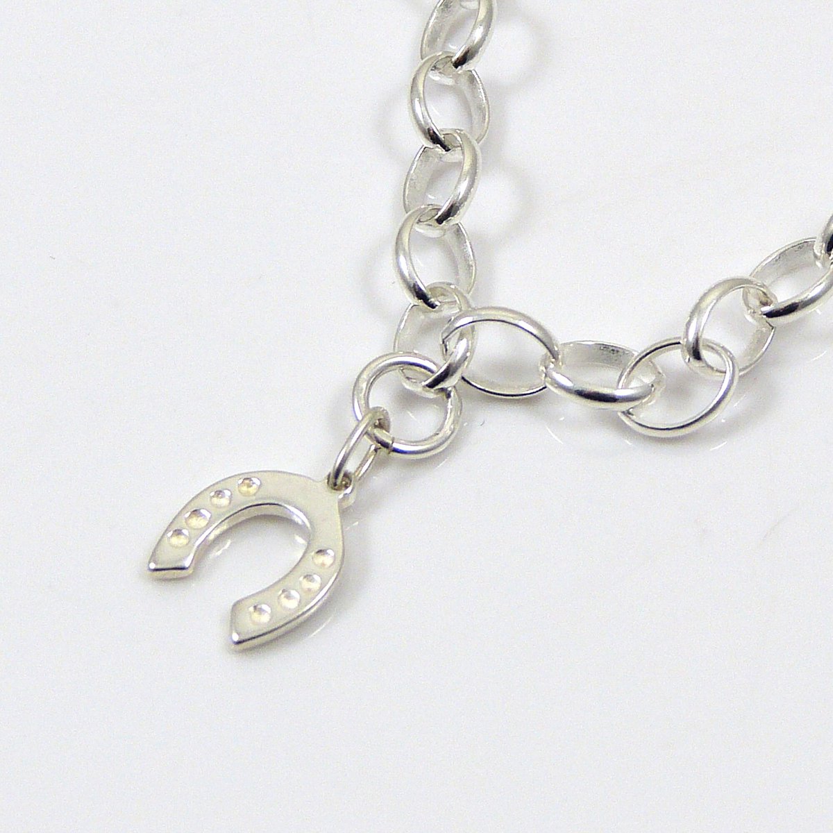 TheStrandline's tweet photo. Sterling Silver Horseshoe Bracelet. 4mm links, Charm Bracelet, Silver Bracelet, Horseshoe Bracelet, 925 Bracelet, Silver Jewellery https://t.co/SV65BPcYP5 #shopindie #thestrandline #HandmadeHour #UKGiftHour #supportsmallbusiness #DelicateBracelet https://t.co/dApqLS3IYN