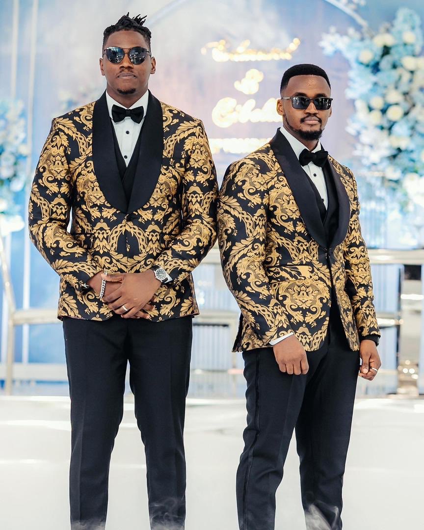 Abashwekyi's tweet photo. Wearing a perfectly-tailored suit when you have a beautiful woman by your side is every man’s dream. 
Get a perfect tailored suit from @CreativeHub_Ug to suit your occasion and claim the success and elegance. Blessed Weekend FAM!! https://t.co/hKuqQTp4Oa