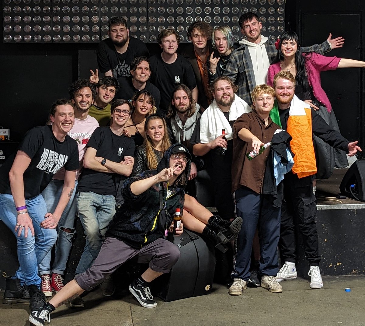 Good kid, love joy, Coco the lost and the touring team posing for a photo after the final show of their tour
