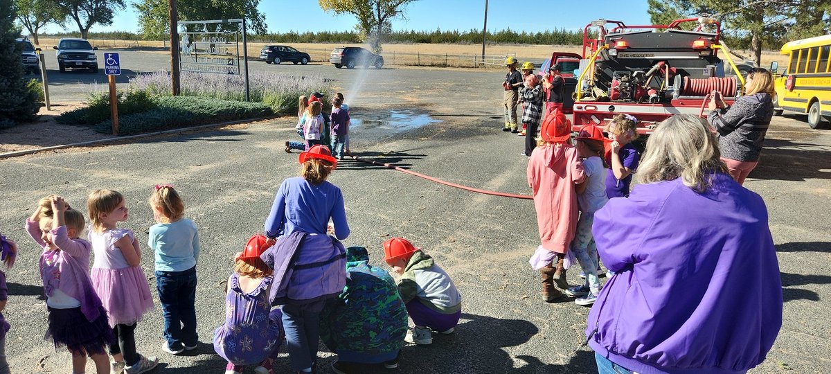 A visit from our volunteer firefighters... teaching little Mustangs how to be safe in the event of a fire.