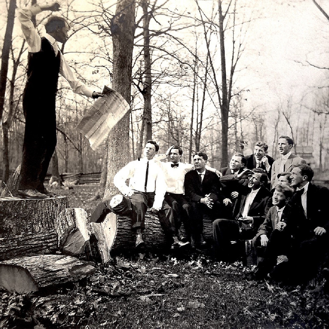 OC_Archives's tweet image. A group of students during the late 1800s/early 1900s gathered for class outside, listening to a fellow student speak.