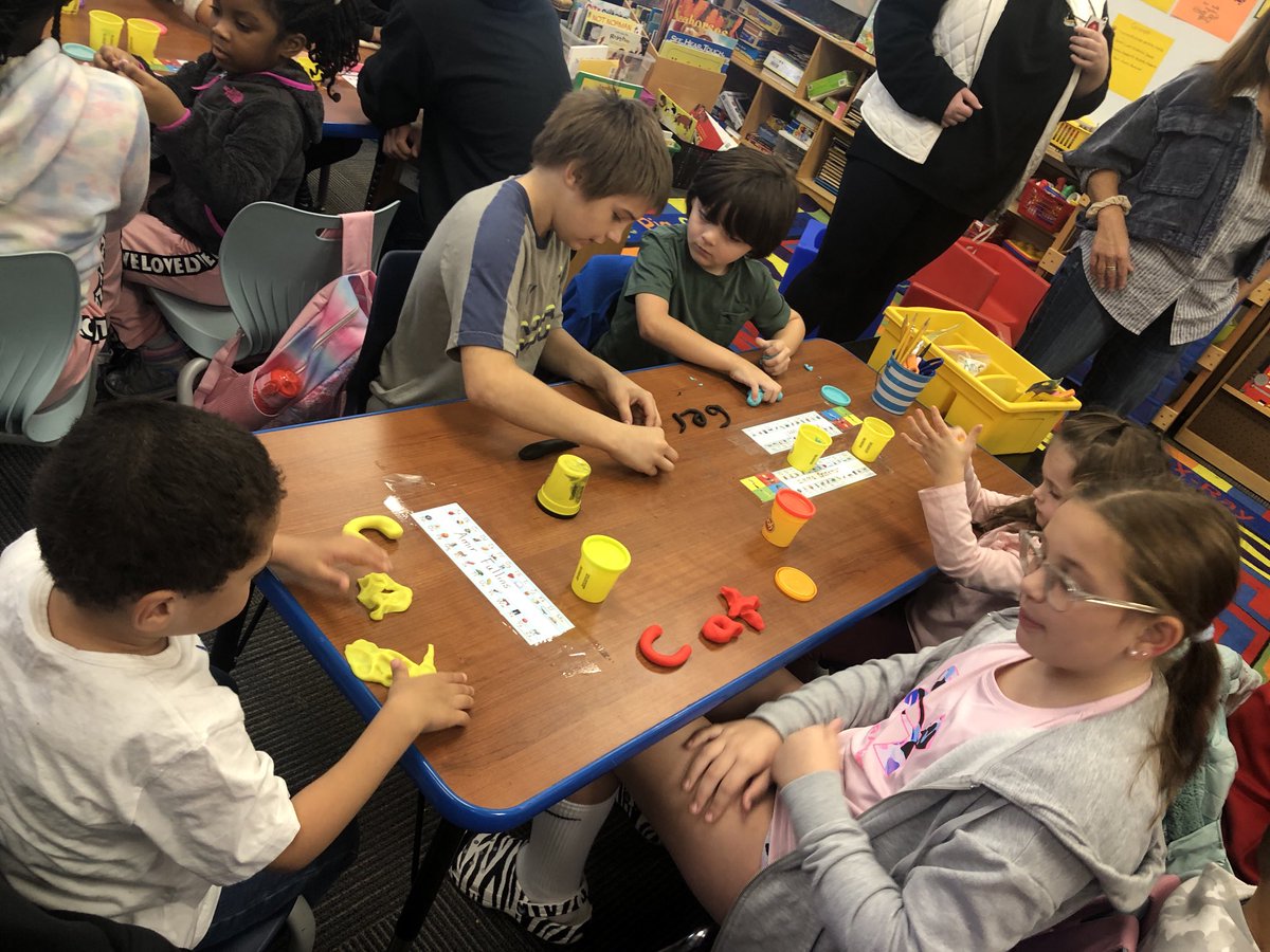 MrsStinson_K's tweet photo. Fifth grade buddies in Mrs. Hornberger’s class are helping the kindergarteners make letters and snap words using play dough! ⁦@TCSD⁩ ⁦@TroySchool18⁩ https://t.co/mcFTxutjbW