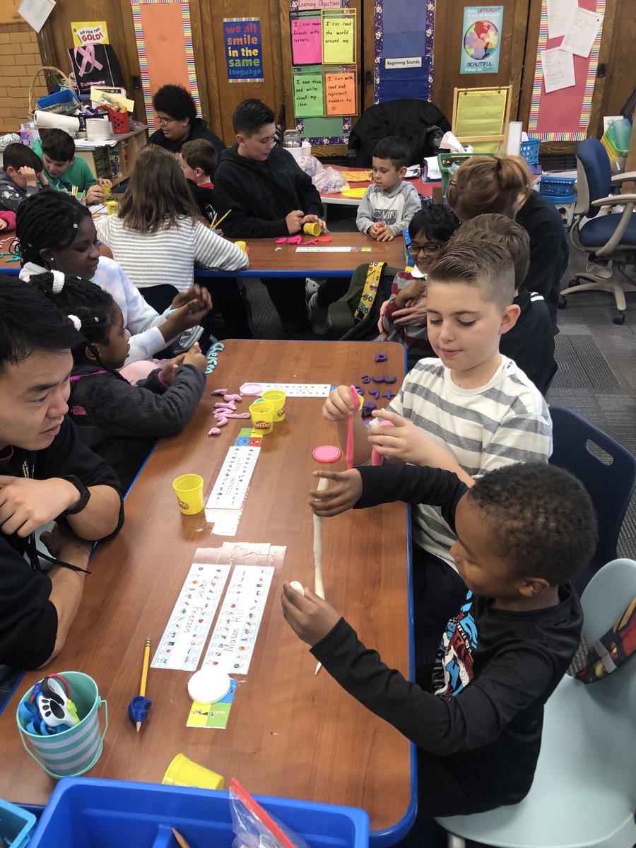 MrsStinson_K's tweet photo. Fifth grade buddies in Mrs. Hornberger’s class are helping the kindergarteners make letters and snap words using play dough! ⁦@TCSD⁩ ⁦@TroySchool18⁩ https://t.co/mcFTxutjbW
