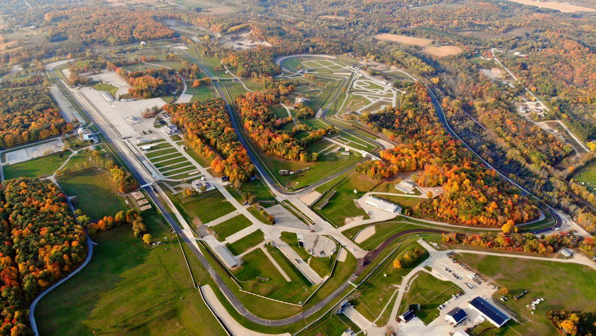 The new pavement base layer is almost down and the Fall colors are almost at peak brilliance. Enjoy!