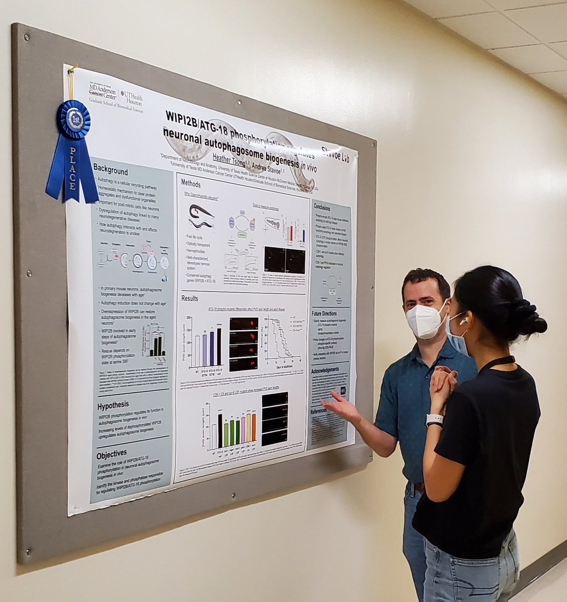 Heather talking about her 1st place poster with our lab neighbor - congrats Heather!!