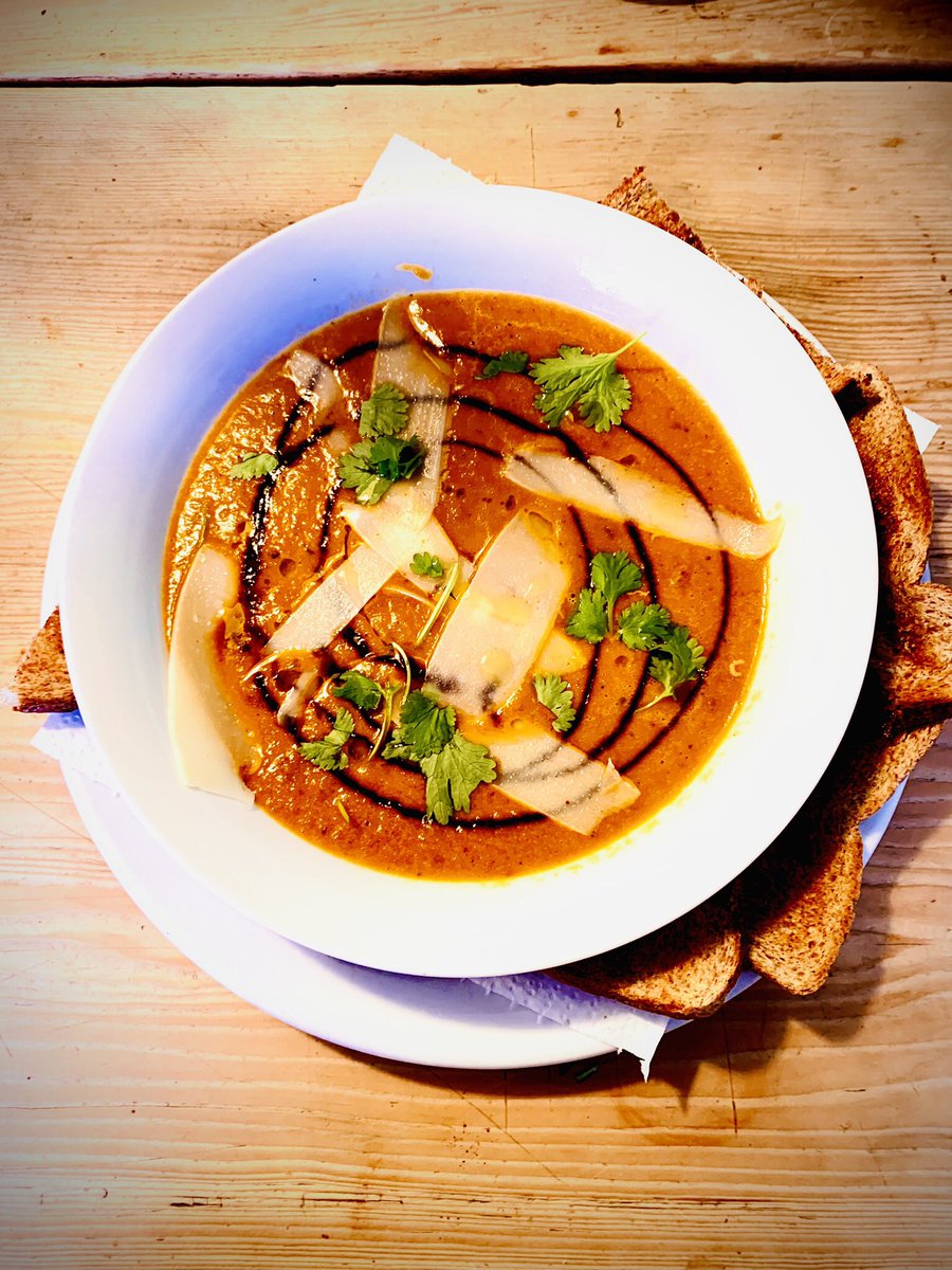 Spicy roast tomato soup with shaved Parmesan, balsamic syrup and coriander. Hit the spot I can tell ya!
