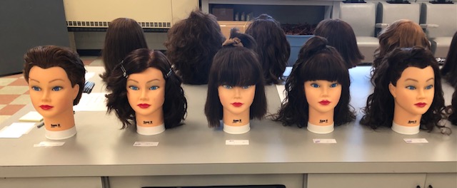 MaryFinley13's tweet photo. An excellent history project in @cherirock54  Cosmetology class! Students had to recreate hairstyles from various decades. #CTEWorks @mcscte https://t.co/0R2e5E1QdK