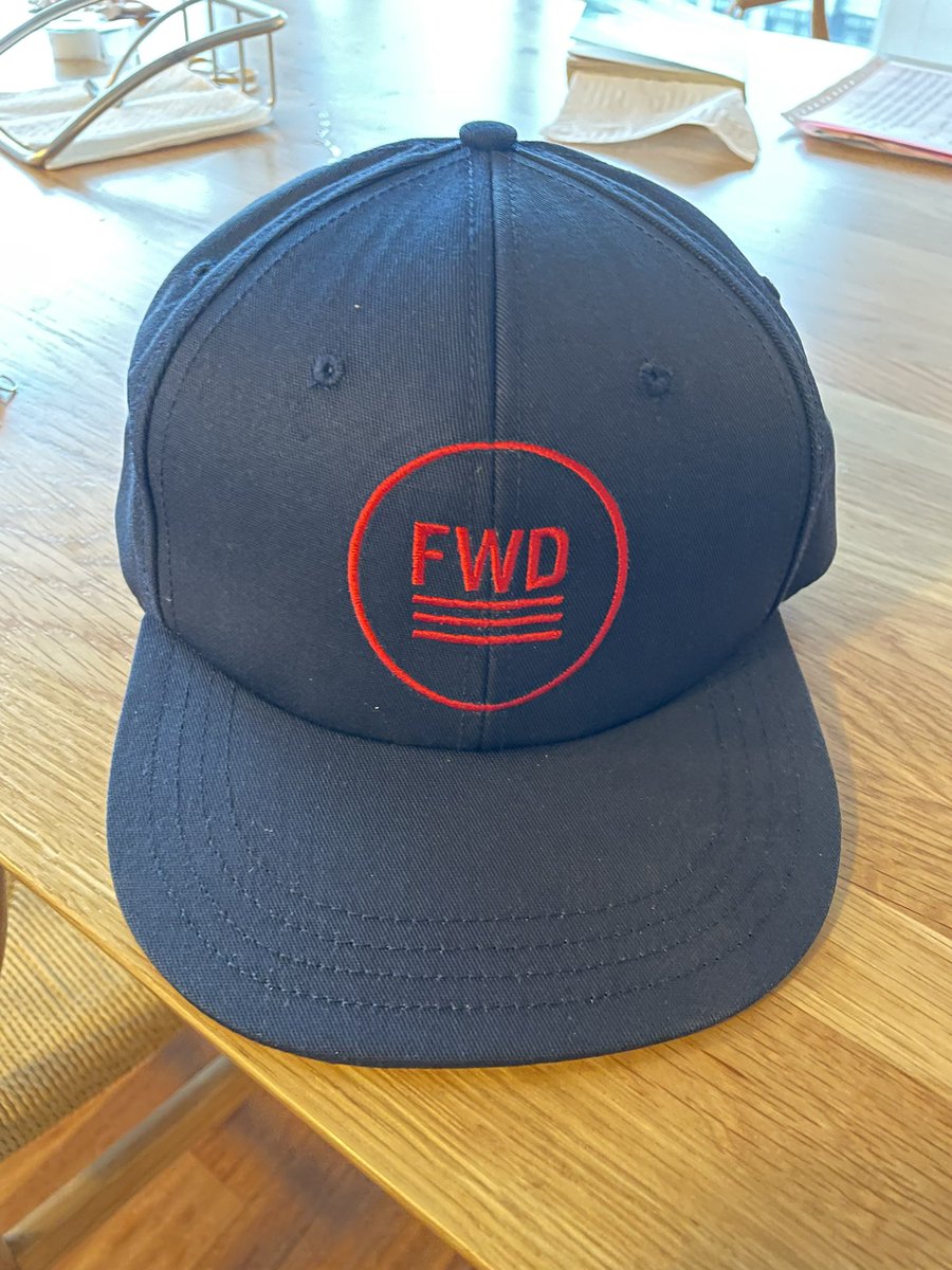 AndrewYang's tweet photo. Look what just arrived - a new @Fwd_Party cap!  Start convos and look sharp.😀⬆️🇺🇸 https://t.co/WrrhizkEEh https://t.co/et9A1ihswN