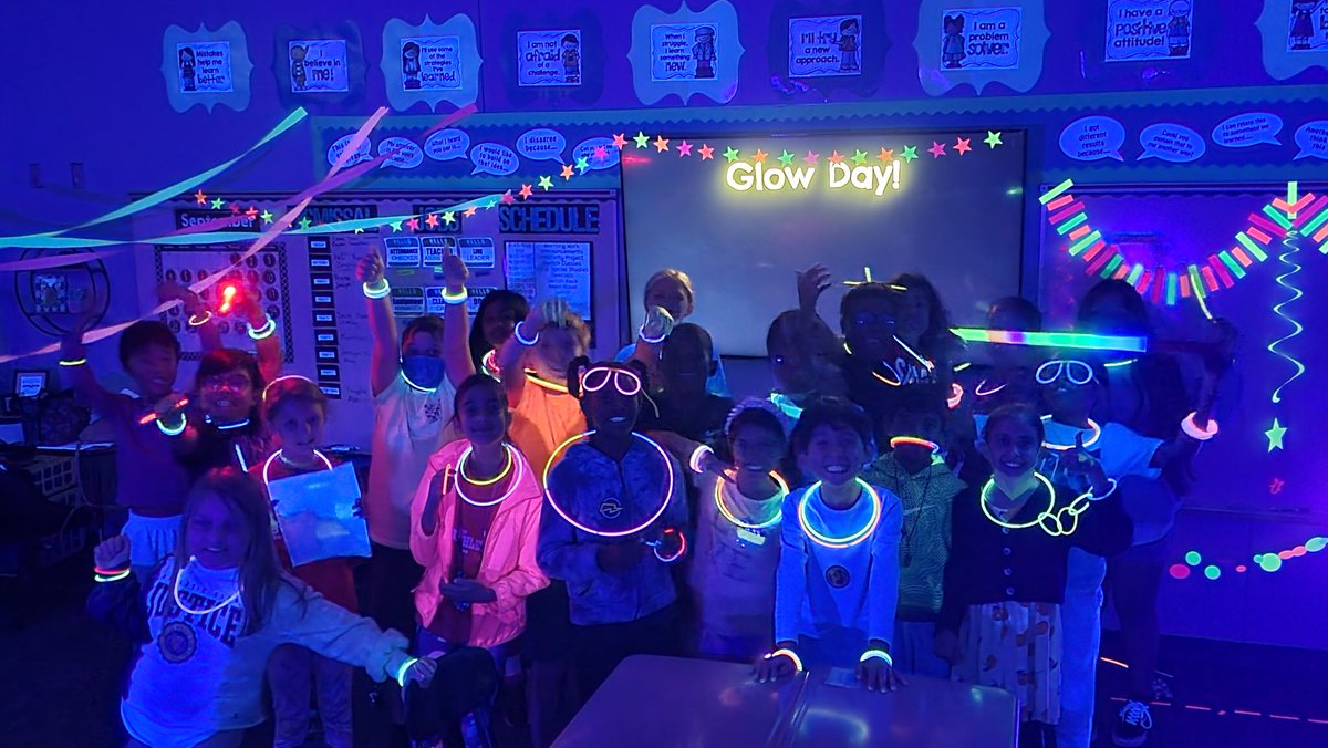 Weatherstone4th's tweet photo. Glow Day 2022! Students are having fun doing place value games in math... all while GLOWING! Best Day Ever! @WeatherstoneES https://t.co/ry35cCc0Mi