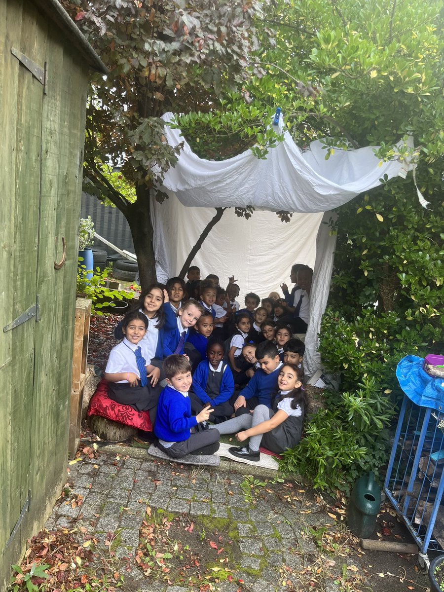 In RE, we continued learning about Judaism. This week we looked at how Jews celebrate Harvest. They make a den called a Sukkah. Here we are in our own Sukkah in Forest School! @stsilasschool #SilasRE